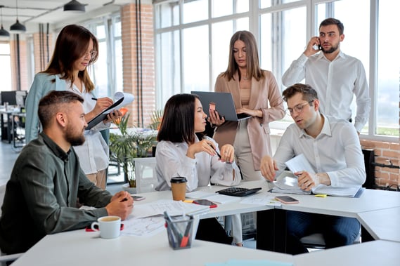 business-people-working-as-team-modern-office-discussing-business-plans-strategies-share-ideas-caucasian-men-women-formal-wear-having-talk-communicating-while-sitting-table