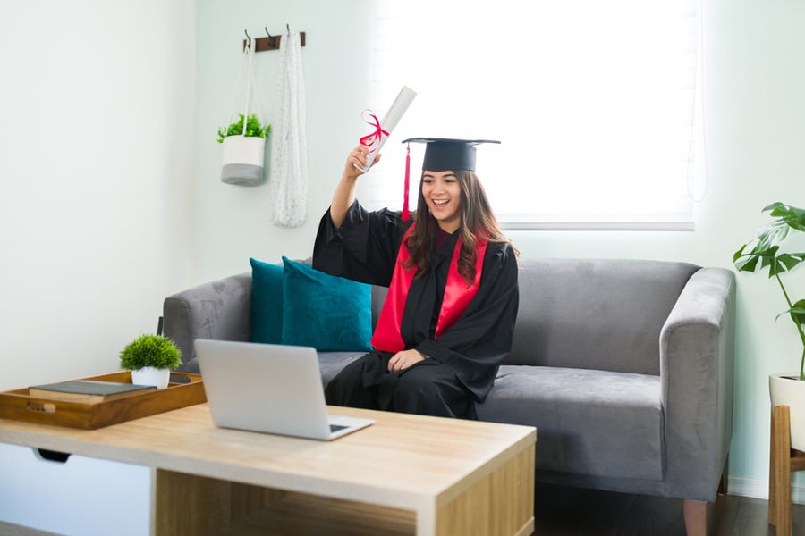 female student having an online graduation