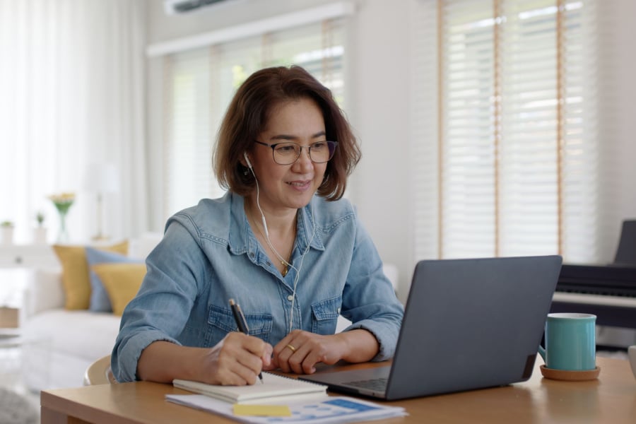 woman attending an online mental health seminar