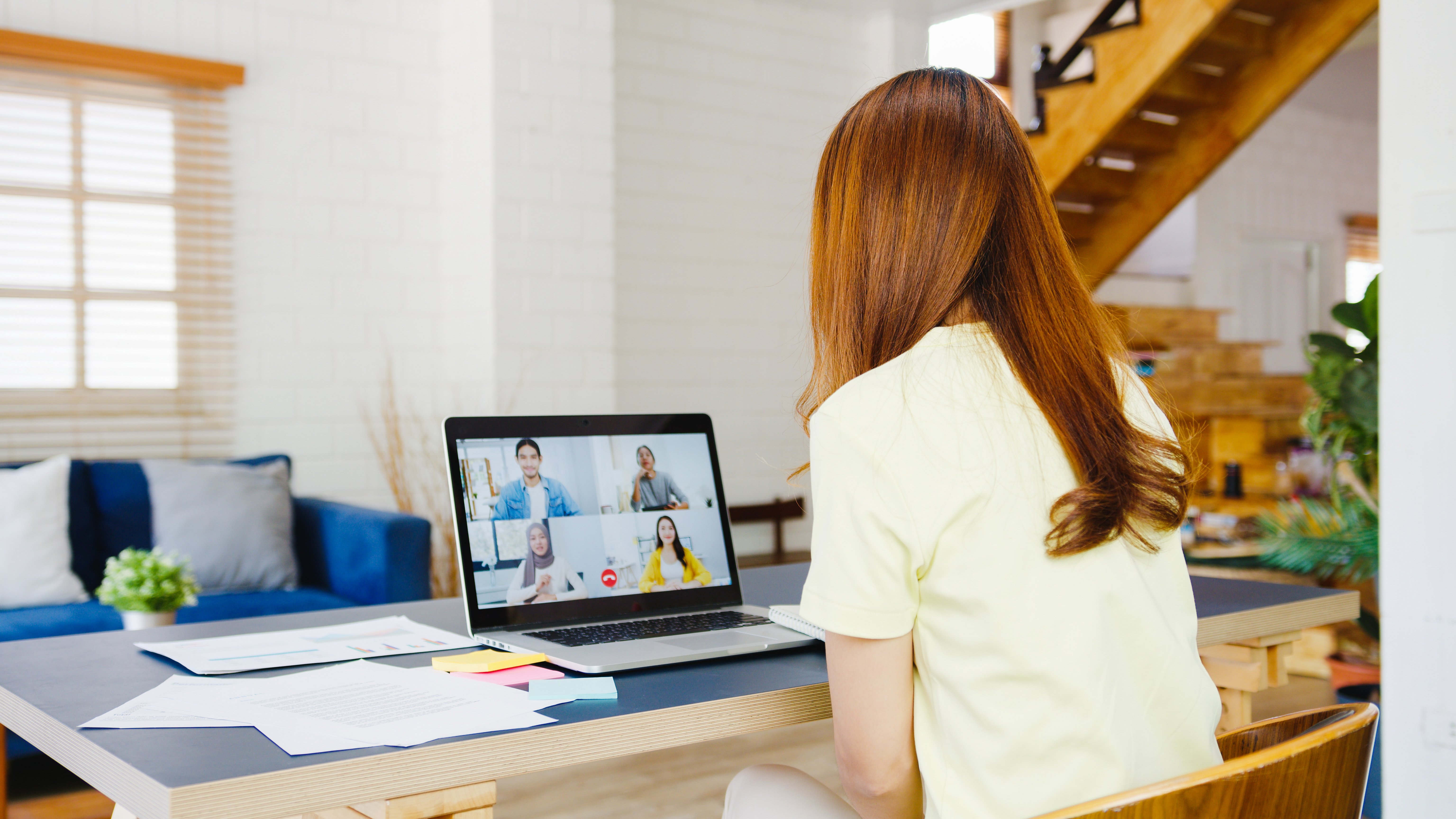 asia-businesswoman-using-laptop-talk-colleagues-about-plan-video-call-meeting-while-working-from-home-living-room-self-isolation-social-distancing-quarantine-corona-virus-prevention